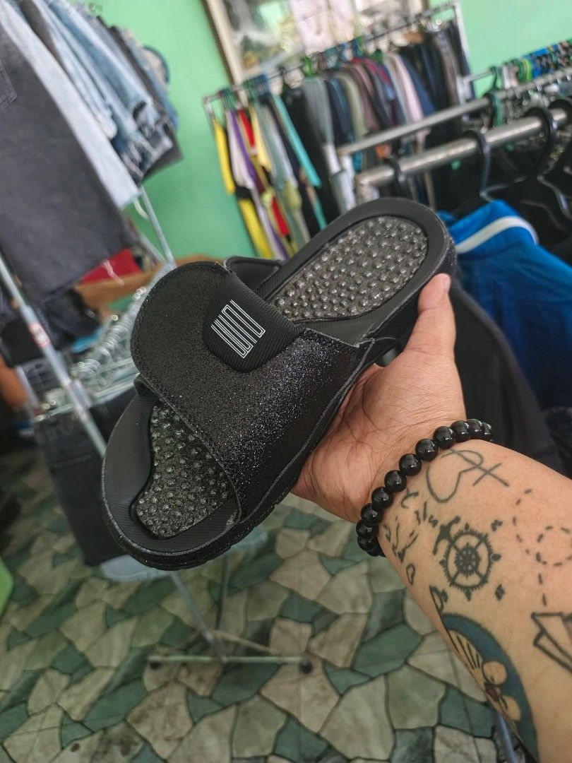 Jordan Slides - White/Black & Black/Red (Category: Slippers & Slides) located in Bacoor. Submitted by davealvare39194 (Listing ID 1441441710, Image 3). Description: - Two pairs of Jordan slides available: White/Black/Red and Black/Red. - Features the iconic Jordan Jumpman logo on both pairs. - Designed for ultimate comfort, perfect for everyday wear. - Ideal for lounging at home or running quick errands. - Adds a sporty touch to any casual outfit