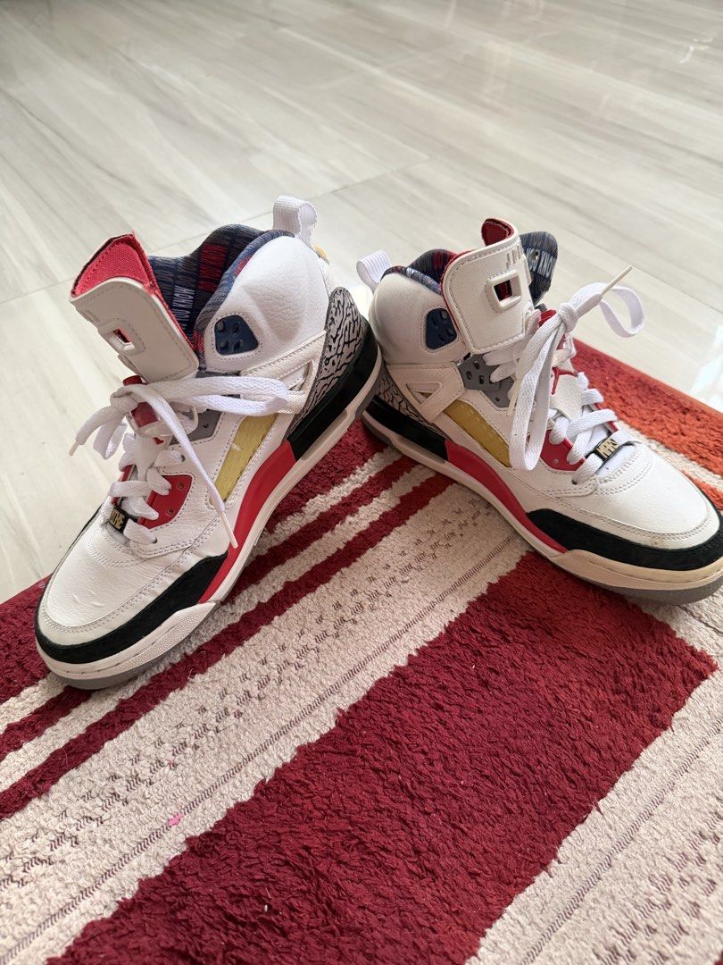 Jordan Spizike White Red Cement Grey (Category: Sneakers) located in Calasiao. Submitted by madisonjade18 (Listing ID 1441407535, Image 1). Description: - White Jordan Spizike sneakers - Red and grey accents throughout - Iconic elephant print detailing on heel and toe - Clean white laces - Unique patterned inner lining - Perfect addition to any sneaker collection.