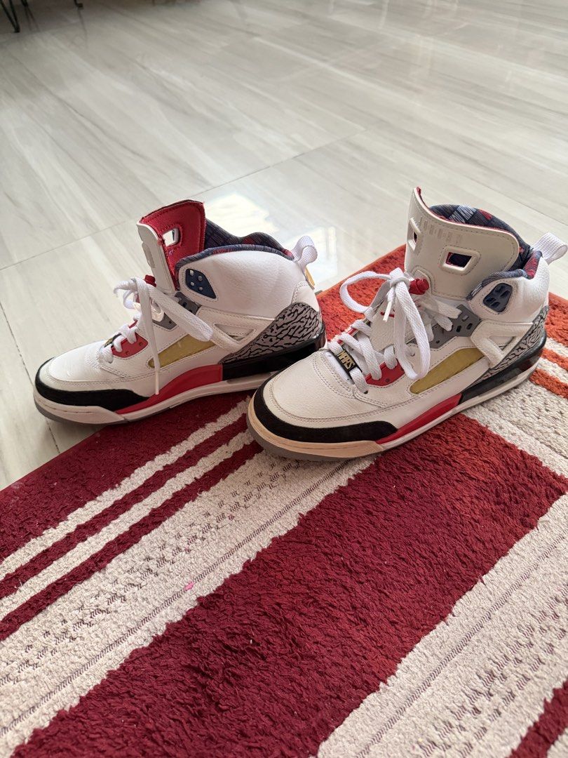 Jordan Spizike White Red Cement Grey (Category: Sneakers) located in Calasiao. Submitted by madisonjade18 (Listing ID 1441407535, Image 2). Description: - White Jordan Spizike sneakers - Red and grey accents throughout - Iconic elephant print detailing on heel and toe - Clean white laces - Unique patterned inner lining - Perfect addition to any sneaker collection.
