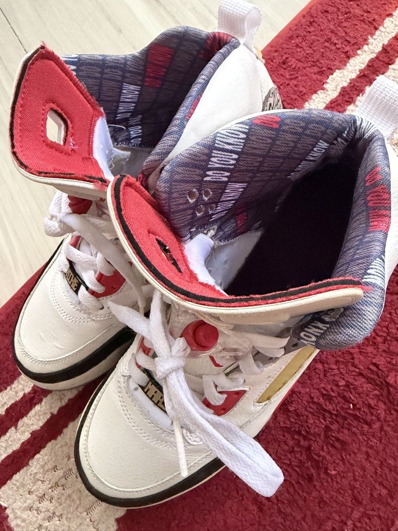 Jordan Spizike White Red Cement Grey (Category: Sneakers) located in Calasiao. Submitted by madisonjade18 (Listing ID 1441407535, Image 3). Description: - White Jordan Spizike sneakers - Red and grey accents throughout - Iconic elephant print detailing on heel and toe - Clean white laces - Unique patterned inner lining - Perfect addition to any sneaker collection.