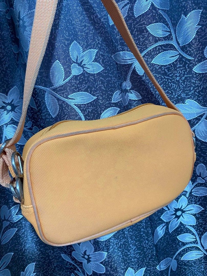 Lacoste vintage crossbody bag (Category: Shoulder Bags) located in Rizal. Submitted by dresscode25.1 (Listing ID 1441486534, Image 2). Description: legit💯💯 vintage what you see is what you get ganda pa ng kulay👌.