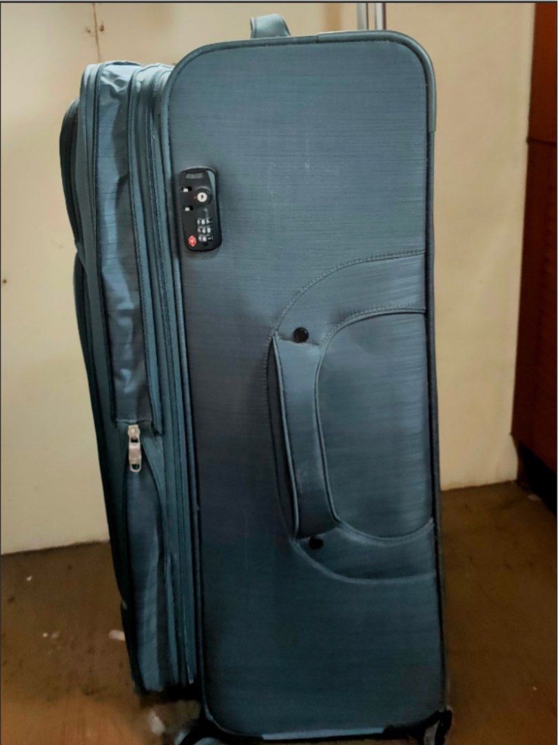 Large Teal Suitcase with Wheels and Combination Lock (Category: Luggage) located in Lipa City. Submitted by mccelle (Listing ID 1441432031, Image 2). Description: I am selling my Luggage XL size. Kindly see 6th photo for sizes. Used Twice Back & Fort to & From Dubai Only Rfs: No plans to go abroad. 🙂 Flaws: None po , pero may sulat sya nv name (4th photo) Make an offer na lang po if good offer naman po , baka okay din pag napagusapan. Thank you!