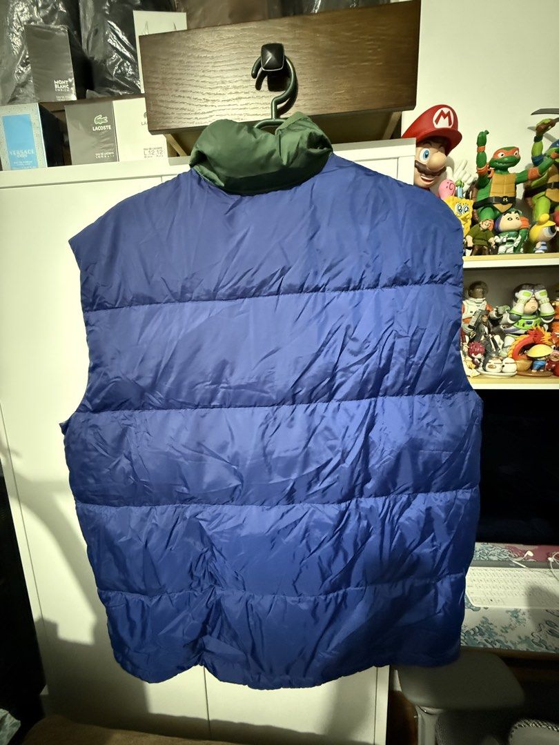 Levi's Oversized Colorblock Puffer Vest (Category: Vests) located in Manila. Submitted by blank_espacio (Listing ID 1441549080, Image 3). Description: - Cool colorblock Levi's puffer vest - Colorblock design: blue, green, and maroon panels - Two yellow flap pockets on the front - Zipper closure - Ideal for layering.