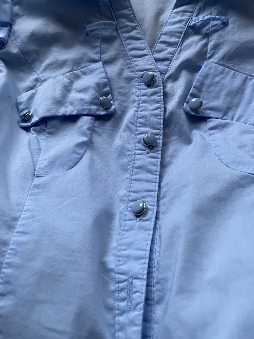 Light Blue Button-Up Short Sleeve Blouse Size S (Category: Blouses) located in Tarlac. Submitted by rieselects (Listing ID 1441463742, Image 3). Description: - Lost buttons - Minor marks on fabric (refer to last photo for details) - Versatile for casual outings or work attire.