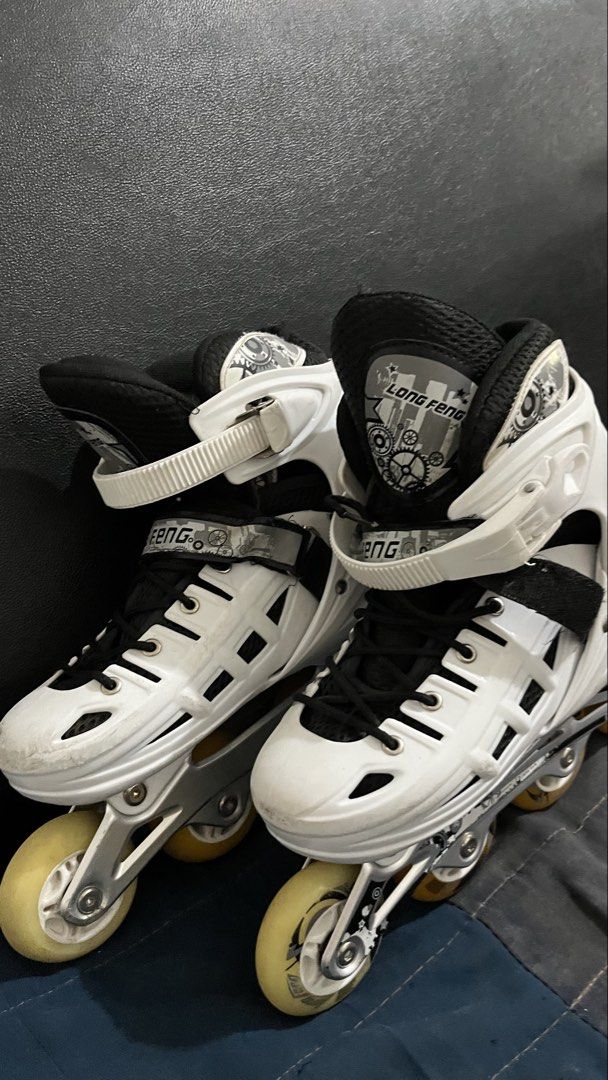 Long Feng Inline Skates White Size 39-42 (Category: Skates, Rollerblades & Scooters) located in San Jose. Submitted by agalayugo25244 (Listing ID 1441406025, Image 2). Description: - White inline skates with black accents - Adjustable size: 39-42 - Good for recreational skating - Wheels show yellowing from use, but are functional - Buckles and laces are intact and secure - Ready for your next skate adventure!.