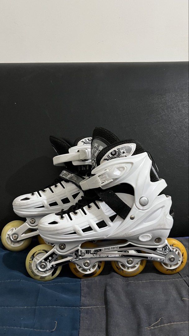 Long Feng Inline Skates White Size 39-42 (Category: Skates, Rollerblades & Scooters) located in San Jose. Submitted by agalayugo25244 (Listing ID 1441406025, Image 1). Description: - White inline skates with black accents - Adjustable size: 39-42 - Good for recreational skating - Wheels show yellowing from use, but are functional - Buckles and laces are intact and secure - Ready for your next skate adventure!.