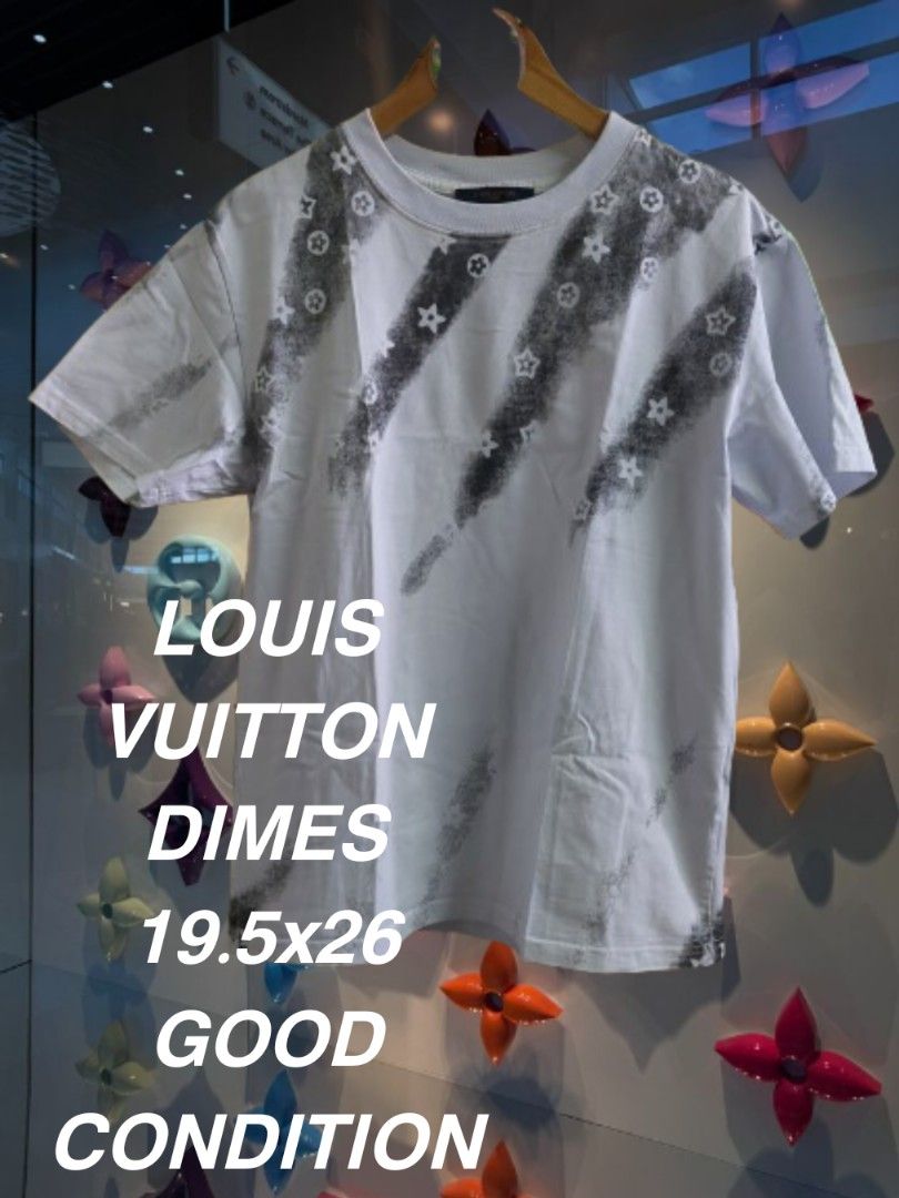Louis Vuitton Dimes T-Shirt (Category: Tshirts & Polo Shirts ) located in Quezon City. Submitted by finds2026 (Listing ID 1441432456, Image 1). Description: - White Louis Vuitton T-shirt - Grey graphic print with LV monogram flowers - Size: 19.5x26 - Condition: Good - Versatile: Pairs well with jeans or shorts - Classic Louis Vuitton piece.
