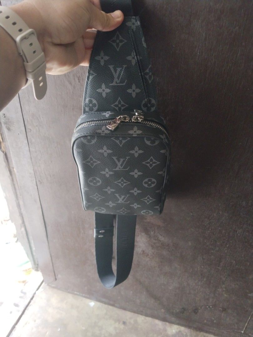Louis Vuitton Monogram Eclipse Sling Bag (Category: Luxury Bags & Wallets) located in Alaminos. Submitted by osaj55756 (Listing ID 1441380276, Image 1). Description: Ukay source - Authentic Louis Vuitton sling bag - Monogram Eclipse canvas (black and grey) - Secure zipper closure - Adjustable strap for comfortable wear - Interior "Louis Vuitton Paris made in France" label - Ideal size for wallet and phone.