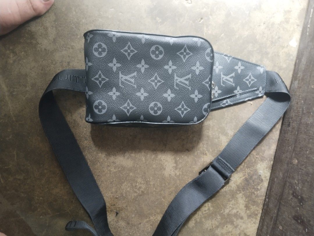 Louis Vuitton Monogram Eclipse Sling Bag (Category: Luxury Bags & Wallets) located in Alaminos. Submitted by osaj55756 (Listing ID 1441380276, Image 2). Description: Ukay source - Authentic Louis Vuitton sling bag - Monogram Eclipse canvas (black and grey) - Secure zipper closure - Adjustable strap for comfortable wear - Interior "Louis Vuitton Paris made in France" label - Ideal size for wallet and phone.