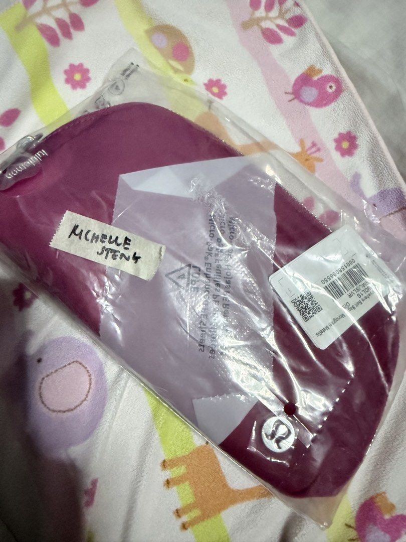Lululemon Everywhere Belt Bag Micro Pink (Category: Purses & Pouches) located in Manila. Submitted by stufforyou2008 (Listing ID 1441424664, Image 2). Description: - Lululemon Everywhere Belt Bag (Micro size) - Color: lovely red - Brand new, still in original packaging - Ideal for carrying essentials - Easy to clean material - Features the iconic Lululemon logo.
