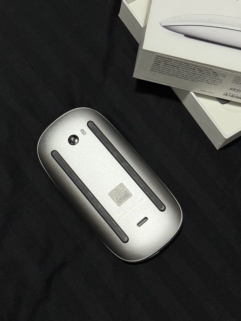 Magic Mouse - White (Model # A3204) (Category: Mouse & Mousepads) located in Manila. Submitted by itsmebrian1003 (Listing ID 1441380408, Image 3). Description: Brand New (Unsealed) Never been used. Complete Accessories, papers, etc. Freebie from the PowerMac Event. Reason for Selling: Not needed, much preferred the typical mouse..