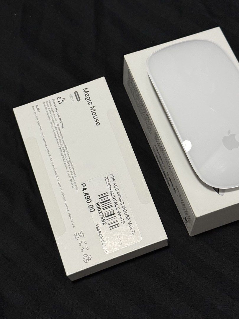Magic Mouse - White (Model # A3204) (Category: Mouse & Mousepads) located in Manila. Submitted by itsmebrian1003 (Listing ID 1441380408, Image 2). Description: Brand New (Unsealed) Never been used. Complete Accessories, papers, etc. Freebie from the PowerMac Event. Reason for Selling: Not needed, much preferred the typical mouse..