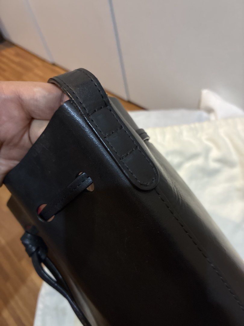 Mansur Gavriel Black Leather Bucket Bag (Category: Luxury Bags & Wallets) located in Rizal. Submitted by jclac.water (Listing ID 1441537057, Image 2). Description: - Classic black leather bucket bag - Brand: Mansur Gavriel - Closure: Drawstring - Handles: Leather - Style: Simple and chic, great for everyday use - Includes: Original dust bag.
