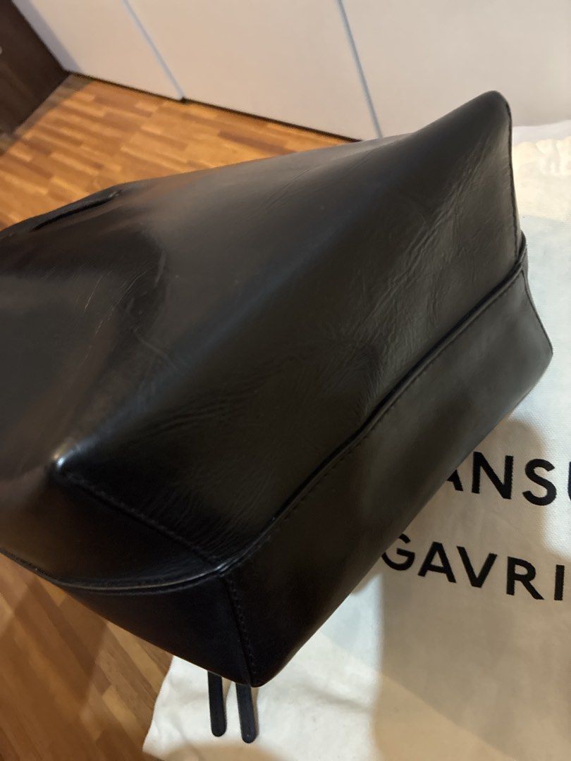 Mansur Gavriel Black Leather Bucket Bag (Category: Luxury Bags & Wallets) located in Rizal. Submitted by jclac.water (Listing ID 1441537057, Image 3). Description: - Classic black leather bucket bag - Brand: Mansur Gavriel - Closure: Drawstring - Handles: Leather - Style: Simple and chic, great for everyday use - Includes: Original dust bag.