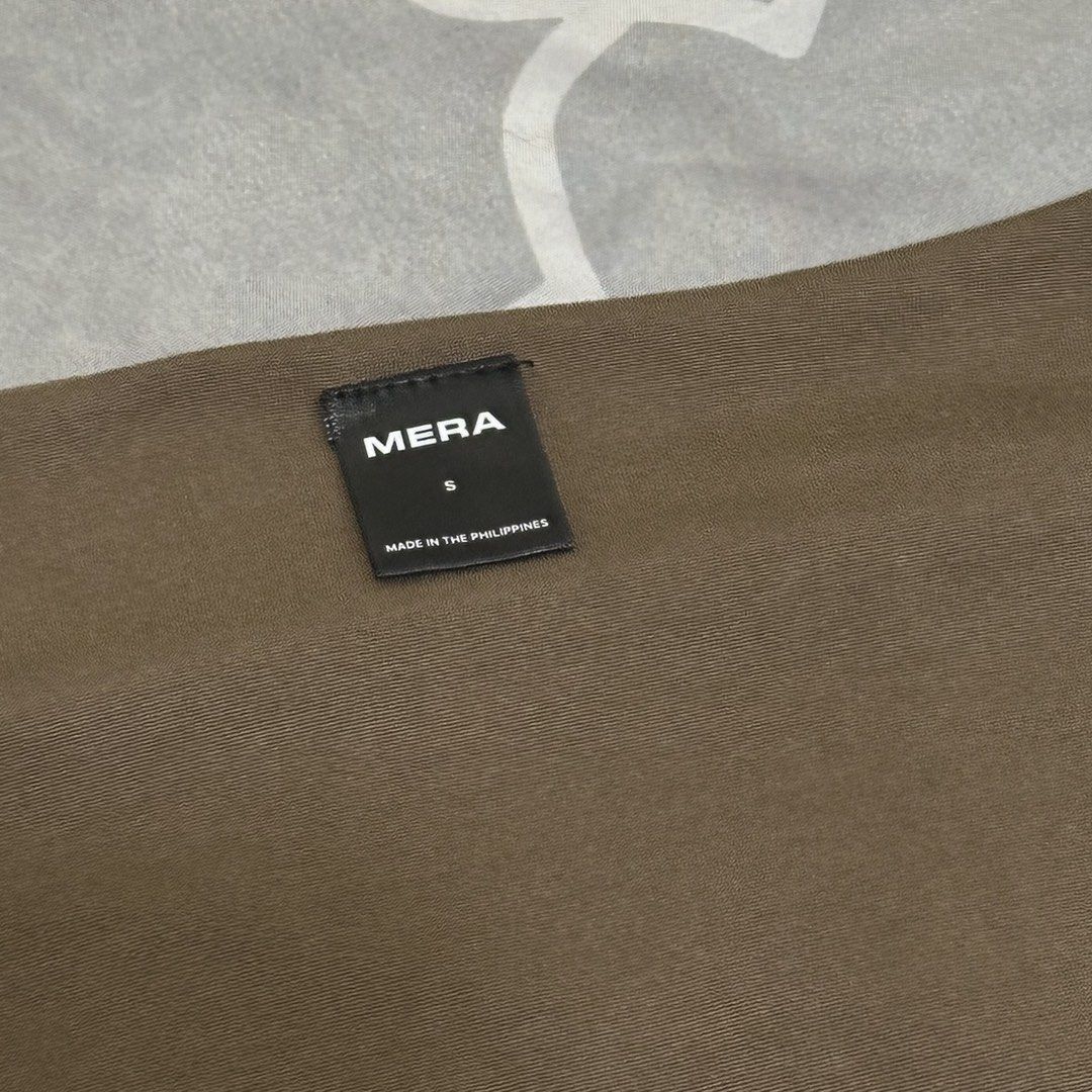 MERA Brown Square Neck Short Sleeve T-shirt Size S (Category: Shirts) located in Davao. Submitted by beys.corner (Listing ID 1441500607, Image 2). Description: - Brand: MERA - Color: Brown - Style: Short sleeve t-shirt - Neckline: Square - Size: S - Origin: Made in the Philippines - Features: Basic, versatile, easy to pair - Ideal for: Everyday wear.