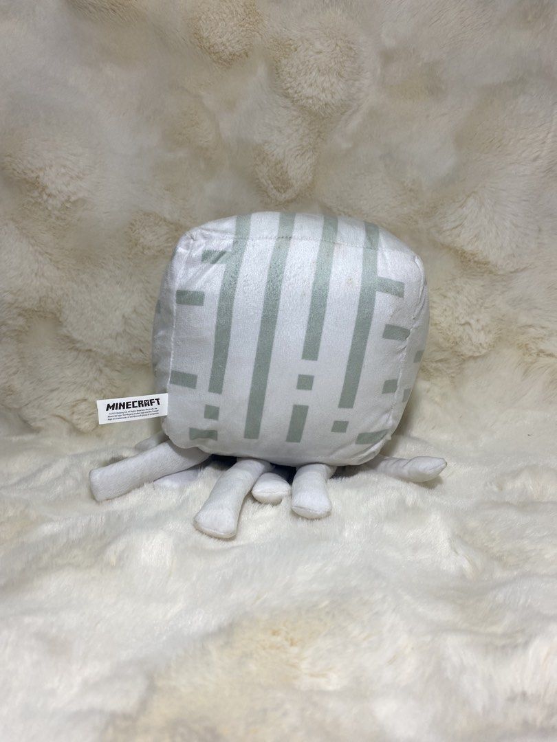 Minecraft Ghast Plush Toy (Category: Plushies & Soft Toys) located in Kalibo. Submitted by ollie_stuffshop (Listing ID 1441520782, Image 3). Description: 23cm x 16cm Before you send your inquiries: ❗️Last Price is already posted ❗️Manage your expectations, WYSIWYG ❗️May need washing ❗️Shipping day is every Sunday - Soft and cuddly Minecraft Ghast plush toy - White with grey pixelated details - Approximately 6 inches tall - Features official Minec