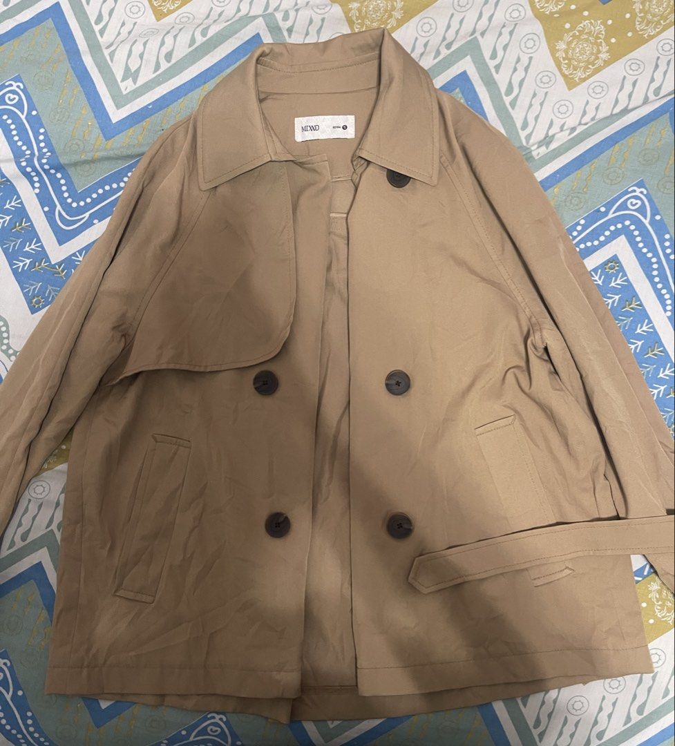 MIXKO Double Breasted Beige Trench Coat Size S (Category: Coats, Jackets and Outerwear) located in Manila. Submitted by fiercestone-4d17 (Listing ID 1441470095, Image 1). Description: - Beige trench coat from MIXKO - Double-breasted style with a belt - Features pockets and button closure - Size S - Ideal for layering over any outfit - Versatile for casual or smart casual looks.