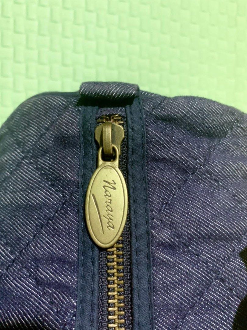 Naraya Quilted Denim Handbag with Bows (Category: Tote Bags) located in Carigara. Submitted by spark2503 (Listing ID 1441428060, Image 3). Description: - Cute Naraya handbag - Dark denim with diamond quilting - Two adorable bows on the front - Secure zipper closure at the top - Made in Thailand - Material: 70% cotton, 30% polyester - Ideal for everyday use.