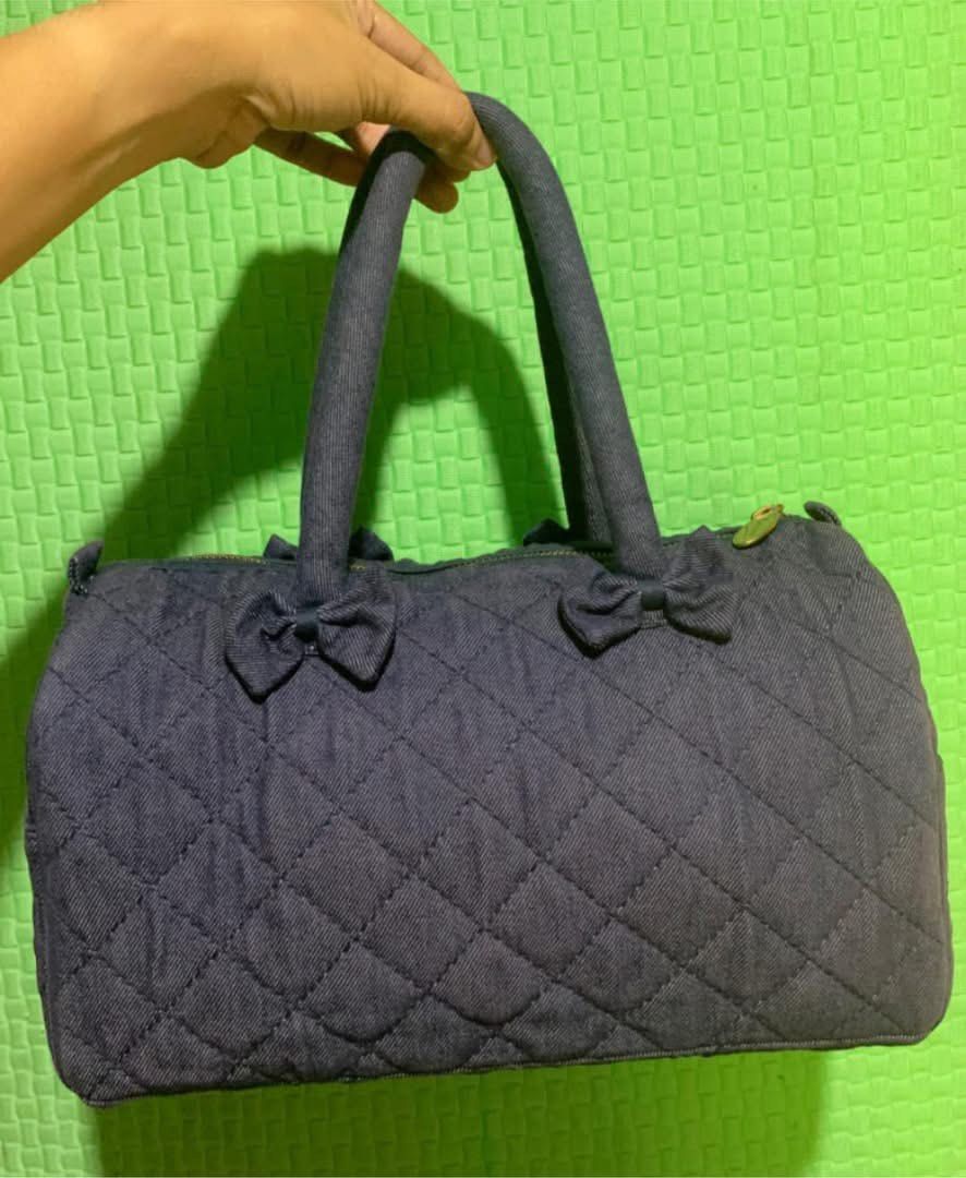 Naraya Quilted Denim Handbag with Bows (Category: Tote Bags) located in Carigara. Submitted by spark2503 (Listing ID 1441428060, Image 1). Description: - Cute Naraya handbag - Dark denim with diamond quilting - Two adorable bows on the front - Secure zipper closure at the top - Made in Thailand - Material: 70% cotton, 30% polyester - Ideal for everyday use.