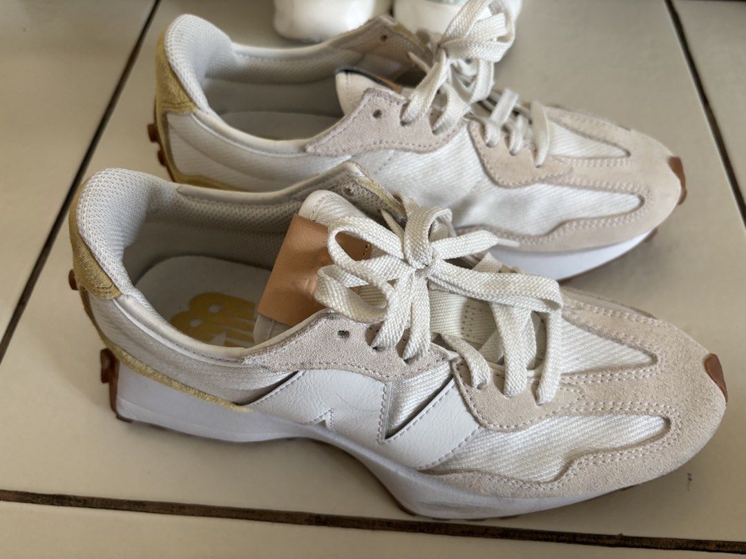 New Balance 327 Sneakers (Category: Sneakers) located in Paranaque City. Submitted by koa30 (Listing ID 1441442319, Image 1). Description: - Classic New Balance 327 sneakers - Stylish cream and tan colorway - Comfortable suede and canvas upper - Durable gum sole with signature tread - Crisp white laces - Ideal for everyday wear - worn twice again can pass as brandnew.