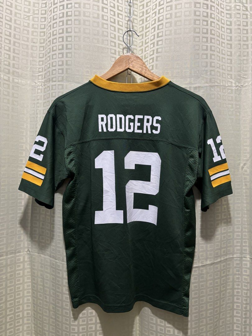 NFL Green Bay Packers Aaron Rodgers (Category: Tshirts & Polo Shirts ) located in Bayambang. Submitted by cartier777 (Listing ID 1441402635, Image 2). Description: Team: Green Bay Packers Player: Aaron Rodgers (#12) Brand: NFL Team Apparel (Official Licensed Product) Size: Large (L) Color: Classic Packers Green, Gold, and White.