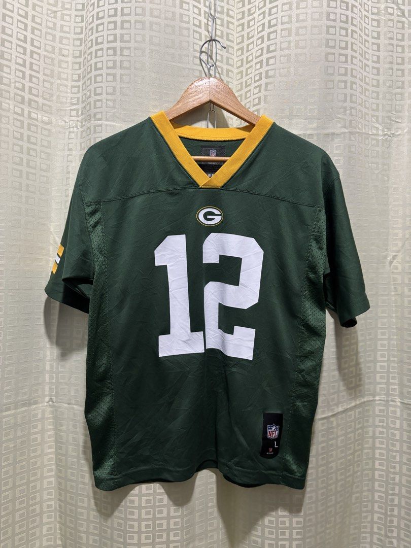 NFL Green Bay Packers Aaron Rodgers (Category: Tshirts & Polo Shirts ) located in Bayambang. Submitted by cartier777 (Listing ID 1441402635, Image 1). Description: Team: Green Bay Packers Player: Aaron Rodgers (#12) Brand: NFL Team Apparel (Official Licensed Product) Size: Large (L) Color: Classic Packers Green, Gold, and White.