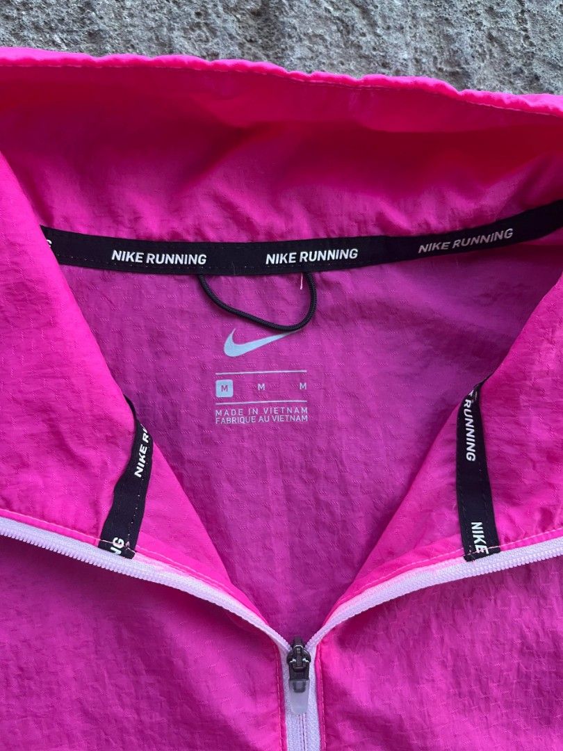 Nike Running Pink Pullover Jacket (Category: Coats, Jackets and Outerwear) located in Calamba. Submitted by mysticcat-5ccee5 (Listing ID 1441515868, Image 3). Description: 📌Nike Multi-Swoosh Running Jacket Size Medium Dimes 📏 Length:23.5 Width:22.5 Excellent to As New Condition 9/10 Cr Last pic issue 💸750+sf.