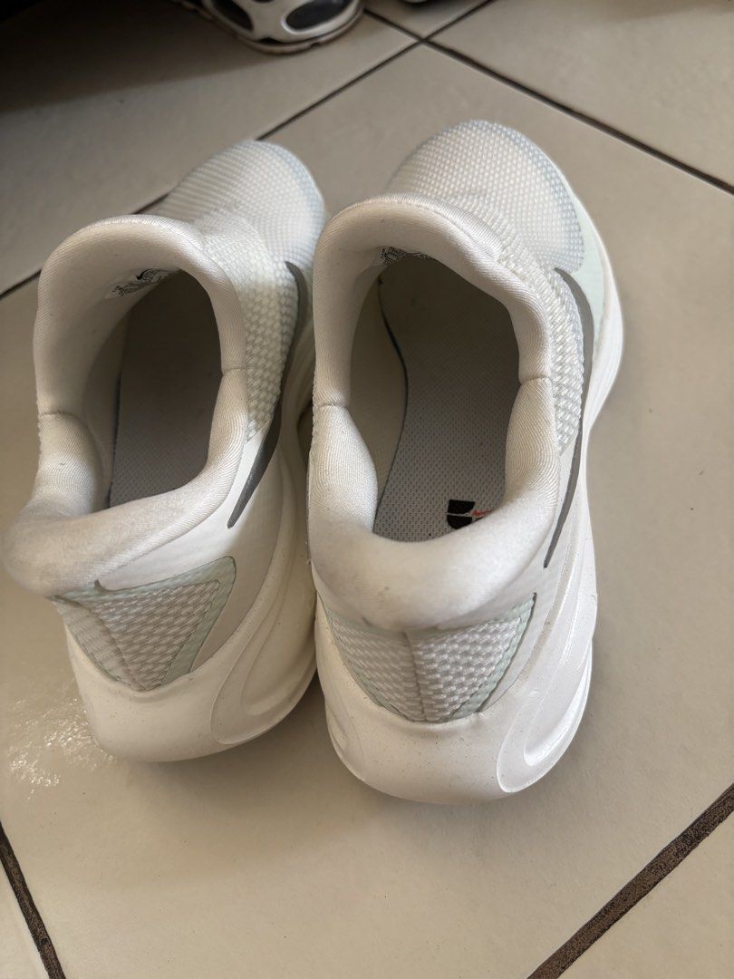 Nike Slip-On Shoes White (Category: Sneakers) located in Paranaque City. Submitted by koa30 (Listing ID 1441443466, Image 2). Description: - White Nike slip-on shoes - Easy to wear, just slide on - Breathable mesh material - Ideal for everyday wear - worn 2x,realized i dont like it so much - 8 US 5.5 UK 39 EUR .