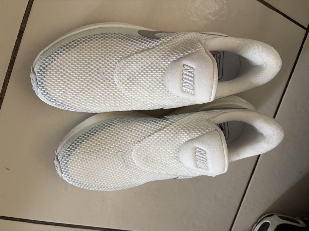 Nike Slip-On Shoes White (Category: Sneakers) located in Paranaque City. Submitted by koa30 (Listing ID 1441443466, Image 1). Description: - White Nike slip-on shoes - Easy to wear, just slide on - Breathable mesh material - Ideal for everyday wear - worn 2x,realized i dont like it so much - 8 US 5.5 UK 39 EUR .