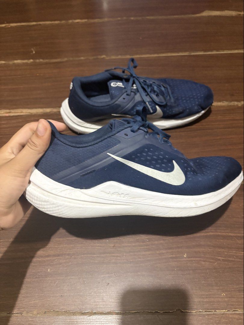 Nike Winflo 10 Running Shoes Navy Blue (Category: Sneakers) located in Makati City. Submitted by sagexoxo (Listing ID 1441483620, Image 2). Description: - Navy blue Nike running shoes - Size 10 (US) - Lightweight and breathable mesh upper - Used less than 8x - Good as new - Lightweight good for running - Bought in Vietnam - You can scan the QR on shoe tag - Bought for 5,4k plus in php.