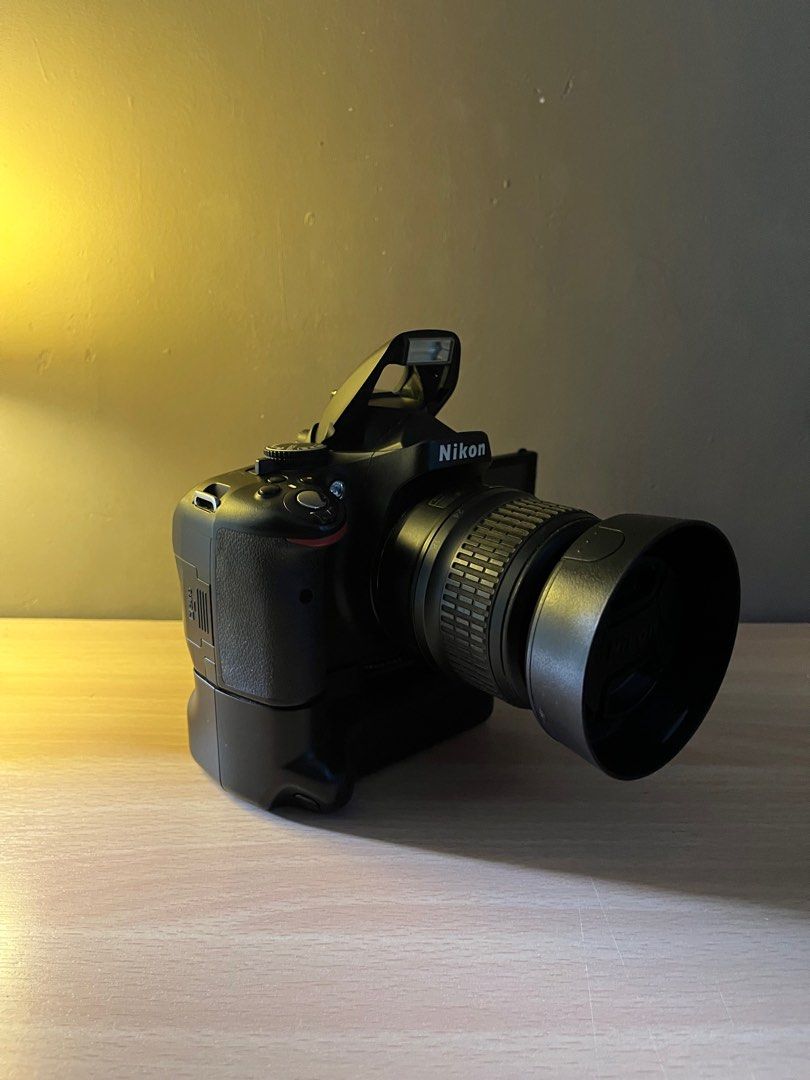 Nikon D5100 DSLR Camera with Battery Grip and Accessories (Category: Cameras) located in Paranaque City. Submitted by yourshoeseller (Listing ID 1441432613, Image 3). Description: Shutter count is 16k Price is only slightly negotiable Includes Battery grip and two batteries Two lens hood included Paranaque location - Nikon D5100 DSLR Camera - Ideal for beginners - Includes Battery Grip for enhanced handling and extended shooting - Comes with orig