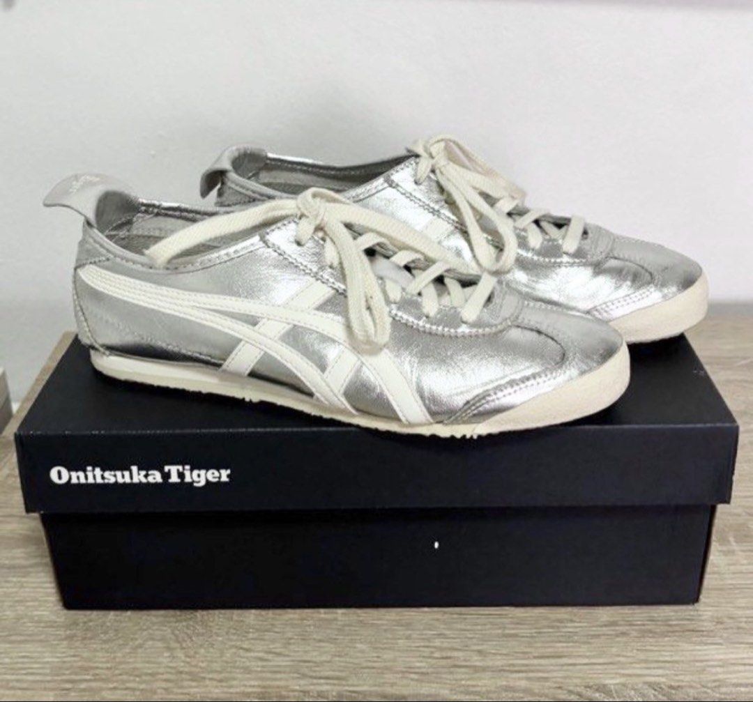 Onitsuka Tiger Mexico 66 Sneakers (Category: Sneakers) located in Singapore. Submitted by jenkegan (Listing ID 1441475294, Image 1). Description: Cool silver metallic color Size EU39.5 / US8 A few scratches in front Lightly used Washed & sanitised Comes with original box .