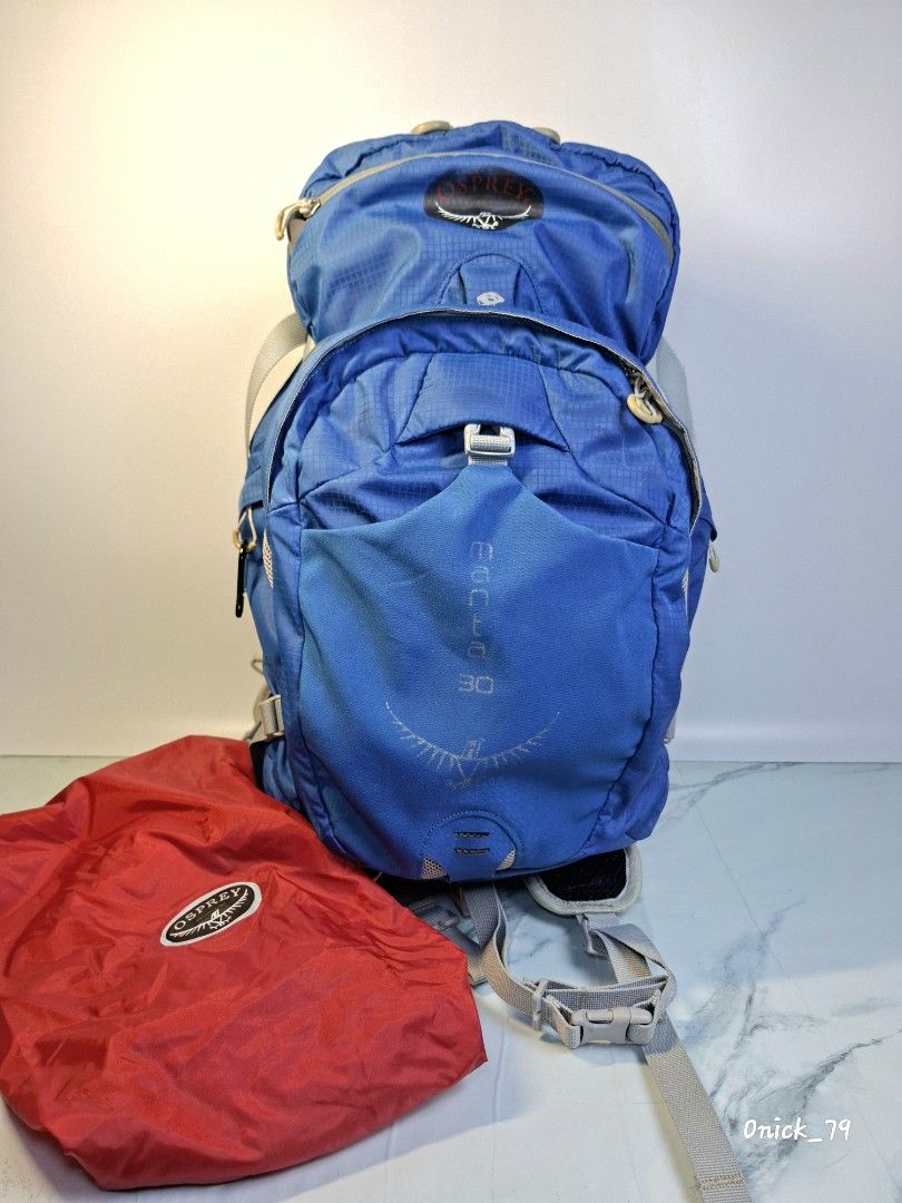 Osprey Manta 30 Backpack (Category: Backpacks) located in Pasay City. Submitted by onick_79 (Listing ID 1441519473, Image 2). Description: °This is an Osprey Manta 30 backpack featuring a blue color scheme and a prominent brand logo on the top pocket. °Designed for hydration, it likely includes a dedicated compartment for a water bladder, often up to 3 liters. °The backpack is intended for multisport use, suitable for activities ranging from hiki