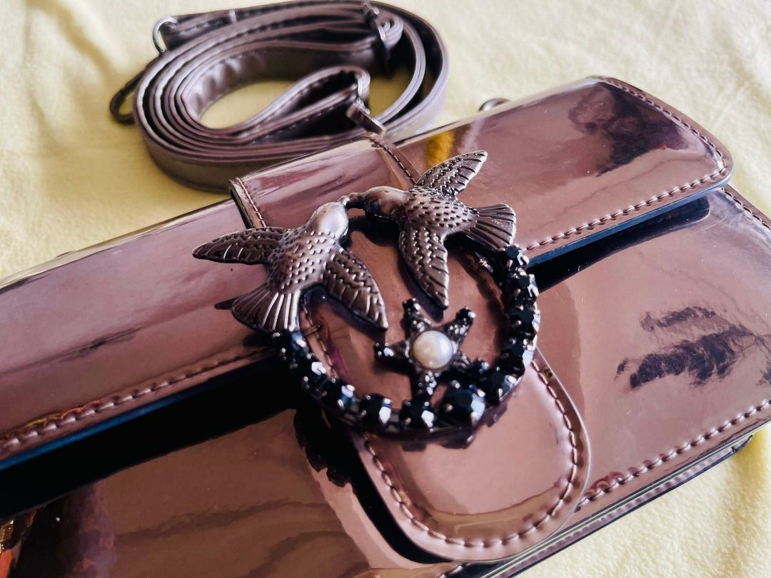 P!nko Love One Mini (Category: Luxury Bags & Wallets) located in Imus. Submitted by cheratedfinds (Listing ID 1441488271, Image 1). Description: P!nko Love One Mini Cl Mirrored Calfskin Shoulder Bag in a reflective metallic finish. Great leather quality and metallic finish. Small size but fits your phone and a small wallet. Minimal Flaw: see last 2 photos .