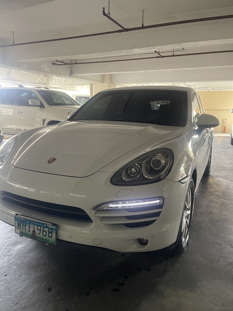 Porsche Cayenne 3.0 Diesel (A) (Category: Used Cars) located in Makati City. Submitted by jp_finds (Listing ID 1441387419, Image 1). Description: 2012 Porsche Cayenne Diesel Good Condition ​TV plus inclusion ​Key Specifications & Features: ​Engine: Fuel-efficient V6 Diesel ​Mileage: 67,xxx kms (Authentic low mileage) ​Plate Ending: 8 (Thursday coding) ​Condition: Fresh, smoke-free interior with a very smooth, luxurious ride. ​Recent Major Mainten