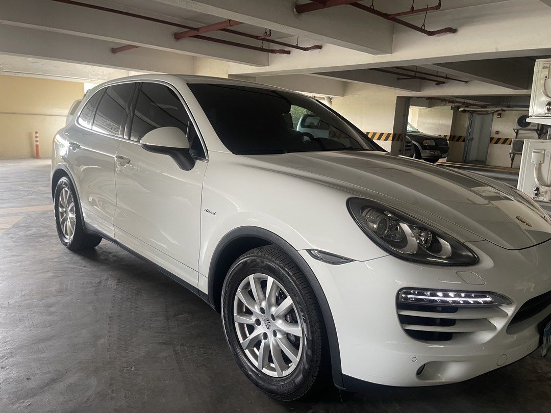 Porsche Cayenne 3.0 Diesel (A) (Category: Used Cars) located in Makati City. Submitted by jp_finds (Listing ID 1441387419, Image 2). Description: 2012 Porsche Cayenne Diesel Good Condition ​TV plus inclusion ​Key Specifications & Features: ​Engine: Fuel-efficient V6 Diesel ​Mileage: 67,xxx kms (Authentic low mileage) ​Plate Ending: 8 (Thursday coding) ​Condition: Fresh, smoke-free interior with a very smooth, luxurious ride. ​Recent Major Mainten