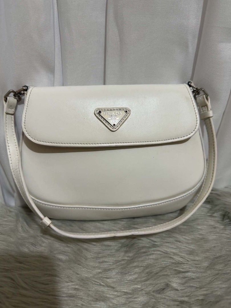 Prada Cleo shoulder bag in white brushed leather (Category: Luxury Bags & Wallets) located in Iloilo. Submitted by solisraque20674 (Listing ID 1441559503, Image 1). Description: .