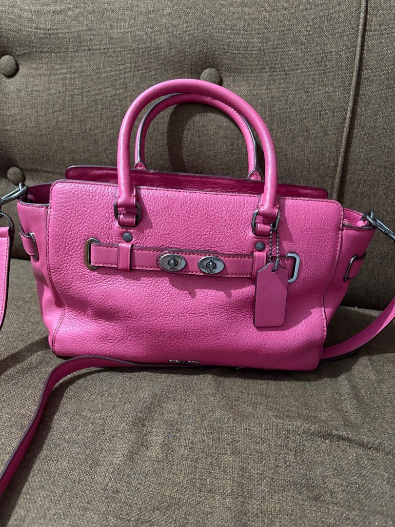 Preloved coach mini swagger / mini blake in pink (Category: Luxury Bags & Wallets) located in Quezon City. Submitted by zeejjj_ (Listing ID 1441456256, Image 1). Description: only issue is the creed and some might need cleaning, .