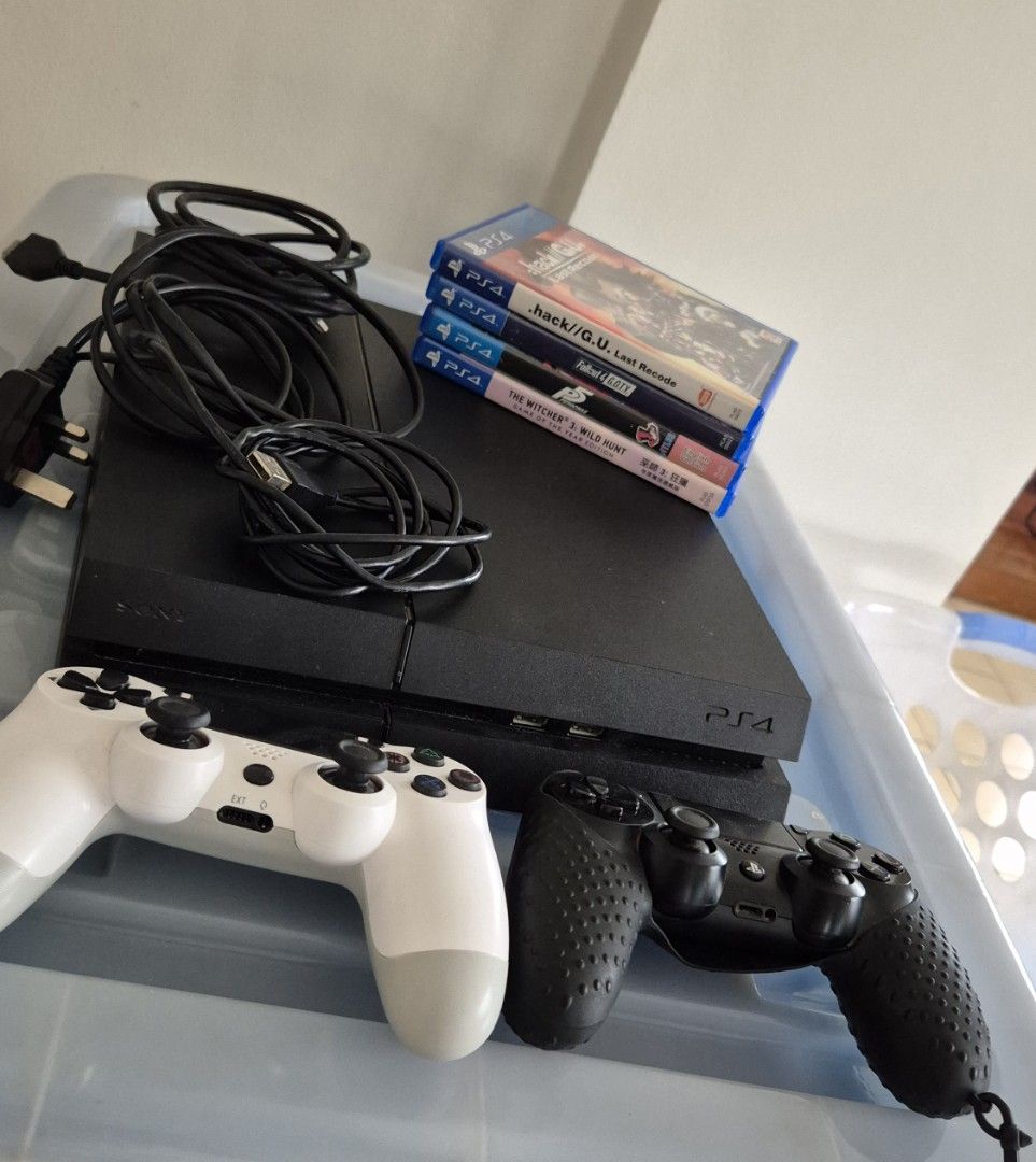 PS4 Console with 2 Controllers and 4 Games (Category: PlayStation) located in Antipolo. Submitted by declutterinboy (Listing ID 1441476463, Image 1). Description: - PS4 Console - 2 Controllers (1 White oem, 1 Black orig) - Comes with orig box not included in pic - 4 Games Included: -.hack//G.U. Last Recode - Fallout 4 Game of the Year Edition - Persona 5 - The Witcher 3: Wild Hunt Game of the Year Edition - Storage: 500 GB Pickup / delivery: uppe