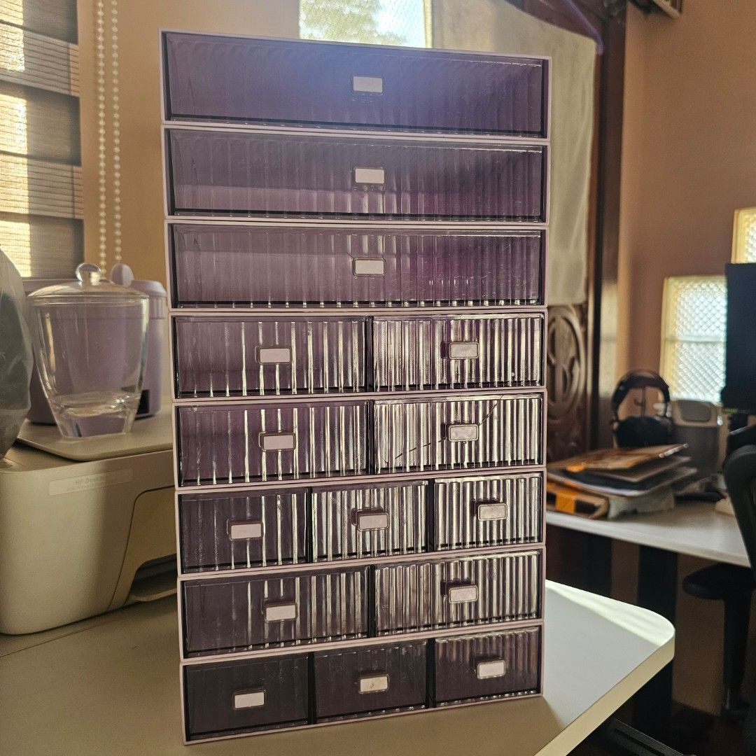 Purple Desk Storage Organizer Drawer Detachable 8layers (Category: Storage Boxes & Baskets) located in Rizal. Submitted by declutterthingswithme (Listing ID 1441475014, Image 3). Description: - Set of purple storage boxes - Stackable design for space-saving - Some boxes feature clear lids - Perfect for organizing craft supplies, jewelry, or small hardware - Feel free to ask any questions! Item is still in new condition handled with care. Reason f