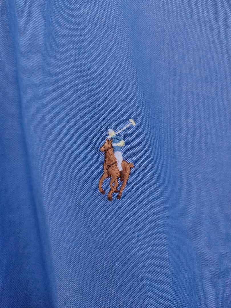 Ralph Lauren Blue Oxford Button Down Shirt (Category: Tshirts & Polo Shirts ) located in Davao. Submitted by thrift2you (Listing ID 1441524474, Image 3). Description: Polo Ralph Lauren Blue-Purple Oxford Long Sleeve Button Down Dimes : 26 x 32 (33½ Back Length) Excellent Condition Color Rate : 9.8/10 Ready to Wear Issue : Very Light Bleach stain sa likod , SEE LAST PHOTO PM ME 📩 📍Davao City.