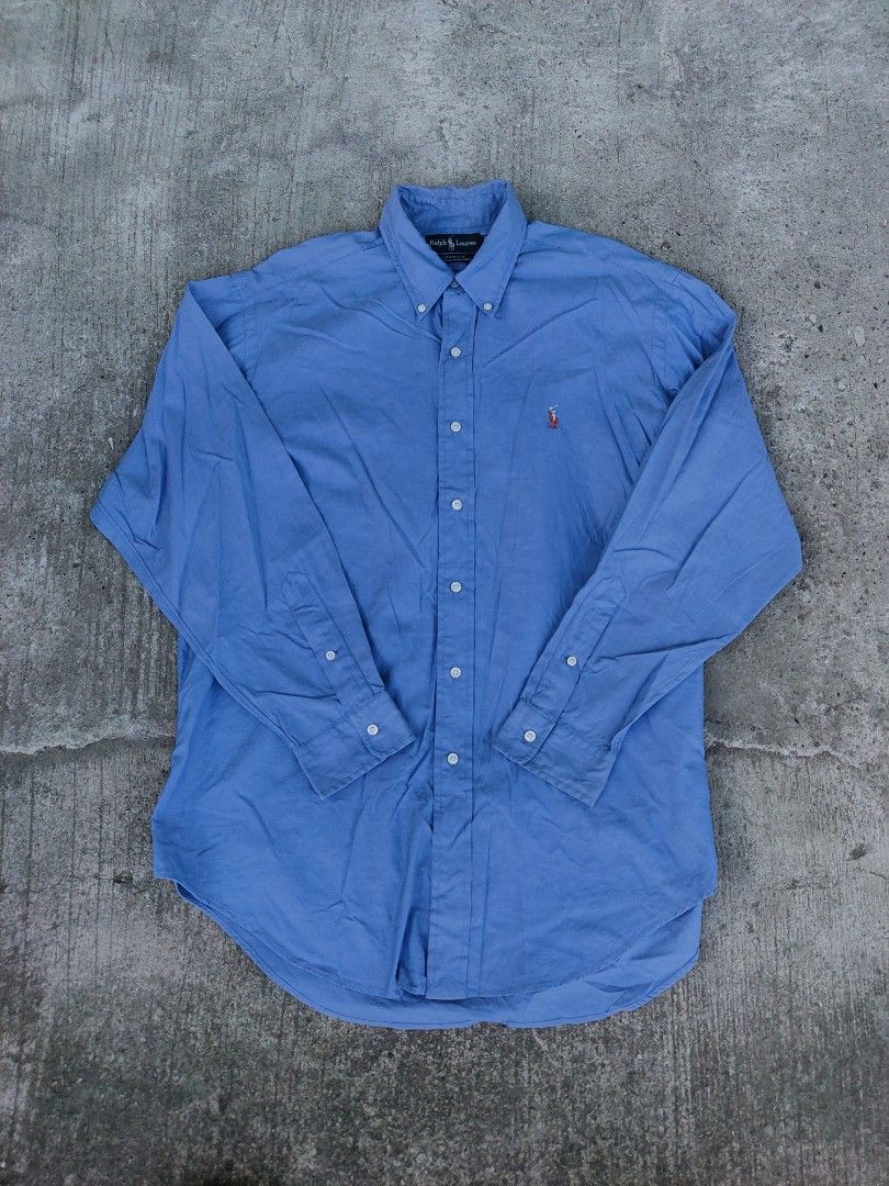 Ralph Lauren Blue Oxford Button Down Shirt (Category: Tshirts & Polo Shirts ) located in Davao. Submitted by thrift2you (Listing ID 1441524474, Image 1). Description: Polo Ralph Lauren Blue-Purple Oxford Long Sleeve Button Down Dimes : 26 x 32 (33½ Back Length) Excellent Condition Color Rate : 9.8/10 Ready to Wear Issue : Very Light Bleach stain sa likod , SEE LAST PHOTO PM ME 📩 📍Davao City.