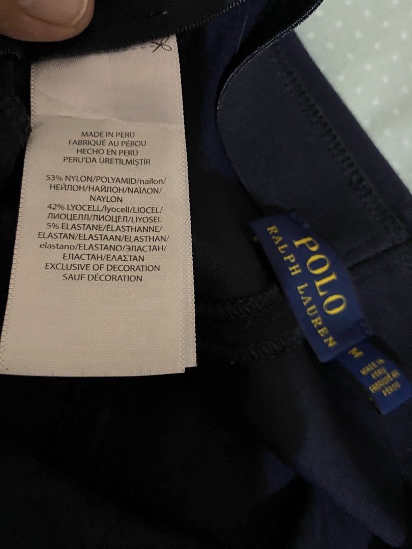 🕊️Repriced! Ralph Lauren Navy Blue Stretch Pants Size 28 (Category: Other Bottoms) located in San Pablo. Submitted by restoredchic (Listing ID 1441522438, Image 3). Description: Authentic Polo RL navy blue pull-on stretch pants, characterized by a flat front, a slim leg, and a clean, minimalist waistband with a small Polo on the upper right side. Cleaned and sanitised Flaws: Sign of use on the bottom part of the pants .