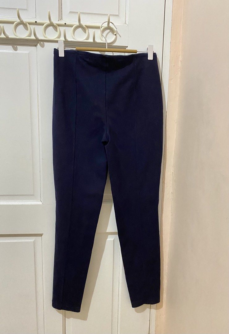 🕊️Repriced! Ralph Lauren Navy Blue Stretch Pants Size 28 (Category: Other Bottoms) located in San Pablo. Submitted by restoredchic (Listing ID 1441522438, Image 2). Description: Authentic Polo RL navy blue pull-on stretch pants, characterized by a flat front, a slim leg, and a clean, minimalist waistband with a small Polo on the upper right side. Cleaned and sanitised Flaws: Sign of use on the bottom part of the pants .