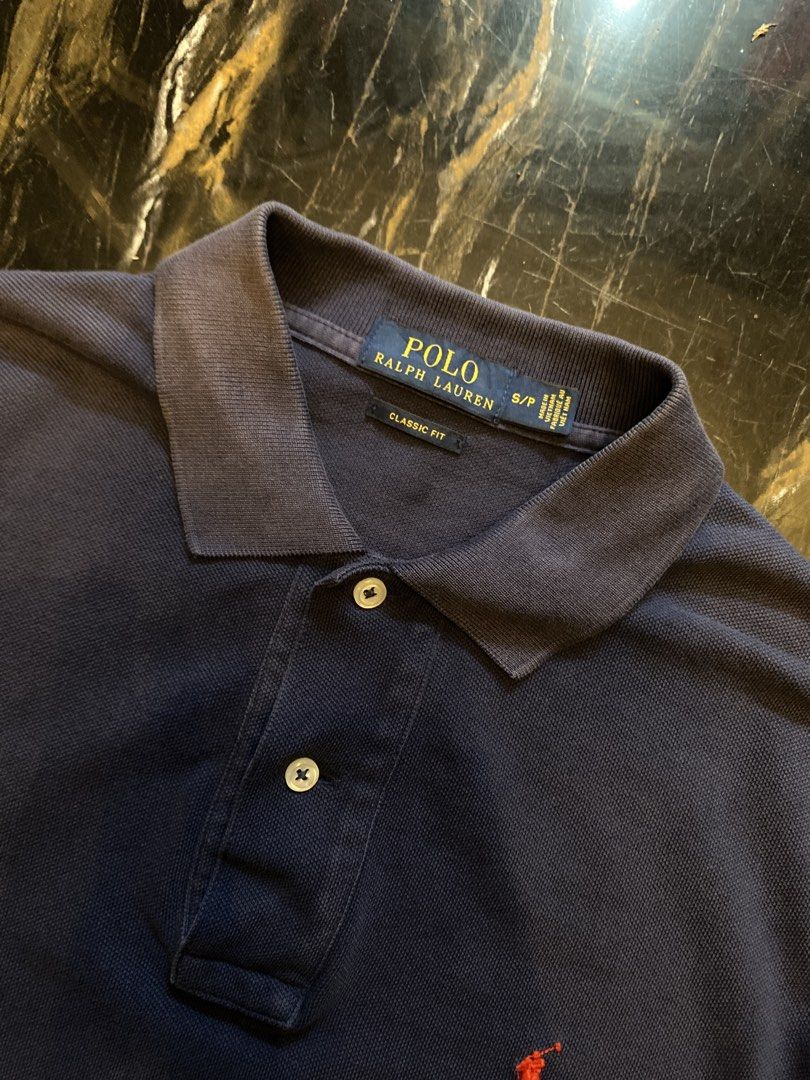 Ralph Lauren Polo Navy Blue (Category: Tshirts & Polo Shirts ) located in Abucay. Submitted by ukaystream (Listing ID 1441469961, Image 3). Description: NEGOTIABLE Size: L - XL Width: 21 Length: 27.5 Issue (s): Slightly Fade Neck Line Condition: 8.9/10 Complete Tags Direct Personal Message for Offers Just Swipe for Other Details Washed and Ready to Wear.