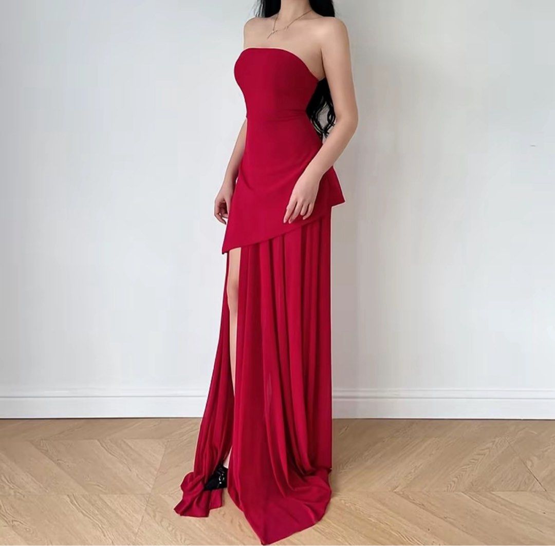 Red Strapless High Slit Asymmetrical Dress (Category: Evening dresses & gowns) located in Mandaluyong City. Submitted by vwonu (Listing ID 1441395582, Image 2). Description: - Beautiful red strapless gown - Features a high slit and asymmetrical hemline - Elegant fabric drape - Floor length - Zipper closure at the back - Perfect for formal events, parties, or a night out.