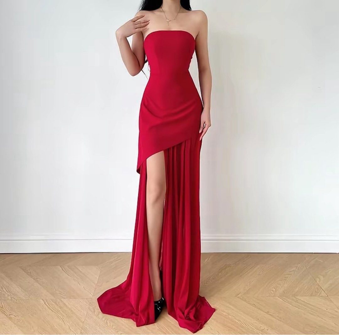 Red Strapless High Slit Asymmetrical Dress (Category: Evening dresses & gowns) located in Mandaluyong City. Submitted by vwonu (Listing ID 1441395582, Image 1). Description: - Beautiful red strapless gown - Features a high slit and asymmetrical hemline - Elegant fabric drape - Floor length - Zipper closure at the back - Perfect for formal events, parties, or a night out.