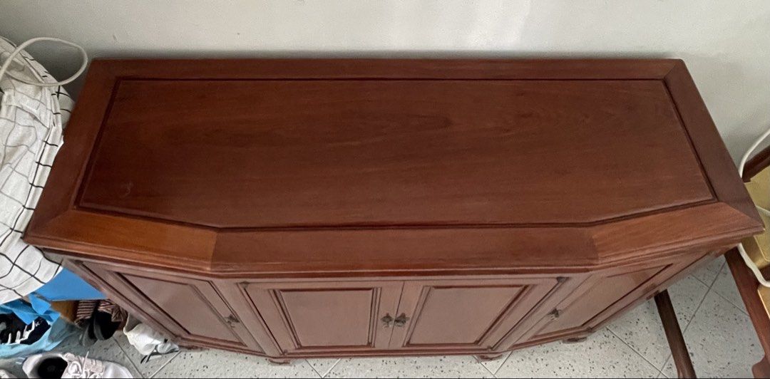 Rosewood cabinet & TV console (Category: TV Consoles) located in Singapore. Submitted by amuletuser (Listing ID 1441453154, Image 2). Description: Well maintained Rosewood tv console or cabinet. Measurement: 111 by 40.5 (middle width) by 78.5cm (height) Side width is 36cm No crack or loose joint. All hinges are functioning. No glass top. Please arrange your own transportation Thanks for viewing..