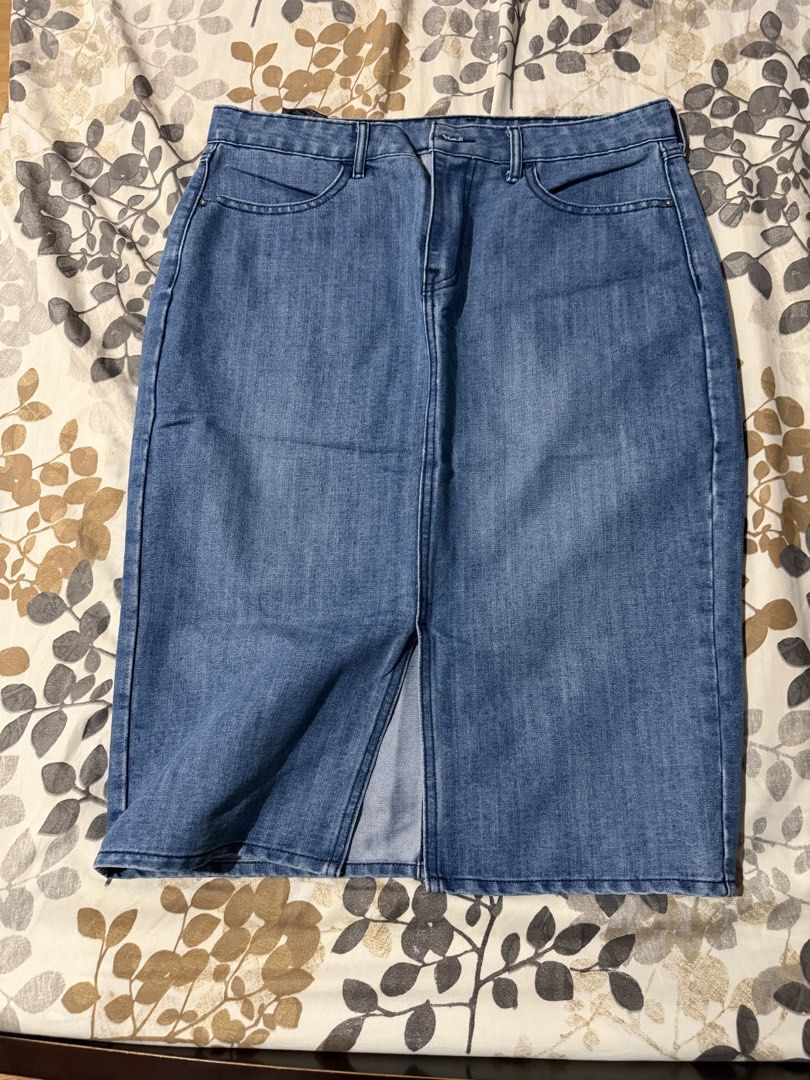 RRJ Denim Midi Skirt Size 33 (Category: Skirts) located in Taytay. Submitted by cloudy_20 (Listing ID 1441526617, Image 2). Description: Classic blue denim midi skirt. Features a front slit for ease of movement. Two back pockets and belt loops. The brand is RRJ. Size 33. Great for casual wear. Orig Price: 800 only used for an event.