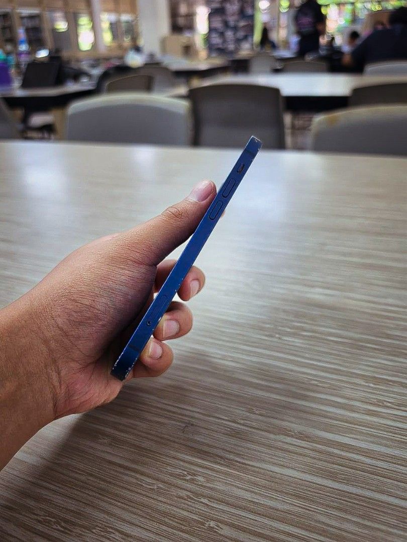Rush Sale iPhone 12 64Gb Blue (Category: iPhone 12 Series) located in Minalin. Submitted by yanhz30 (Listing ID 1441499876, Image 2). Description: RUSH SALE FU iPhone 12 64GB Blue - all parts original including lcd, battery, back glass, etc ✅️ truetone working ✅️ face id working ✅ ️76 BH ✅️ NTC approved ✅️ Factory Unlock ✅️Open line/no sim restrictions (any sim pwede) ✅️no issue aside from minor paint chips / dents ✅️✅️no repair history Inclusion